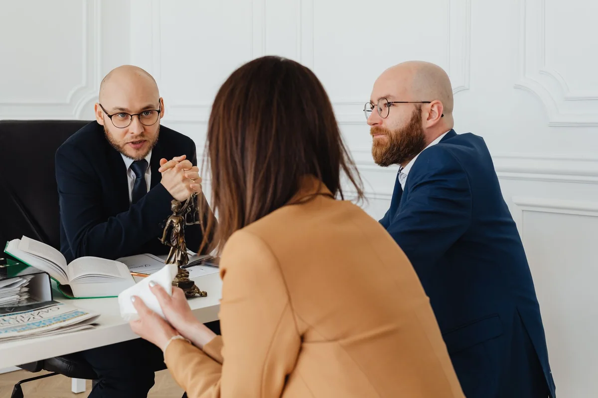 A probate attorney meeting with a client in an Iowa office