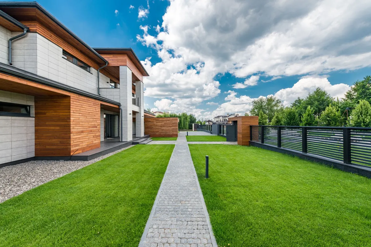 The exterior and yard of an Iowa home listed for sale