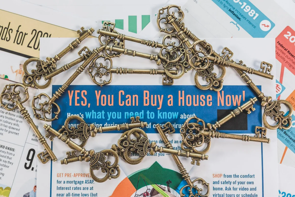 House keys passed across a table after an Iowa estate settles its debts