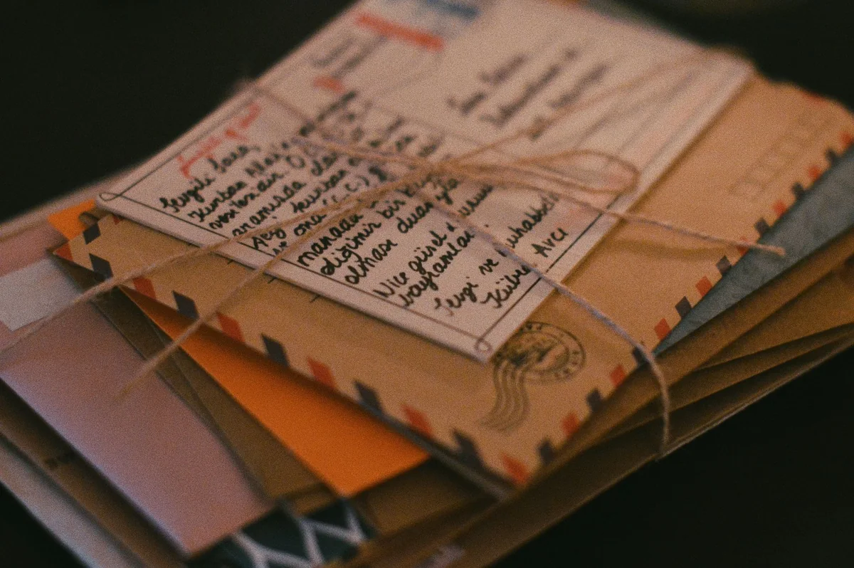 A stack of mailed notices representing the 120-day federal foreclosure rule