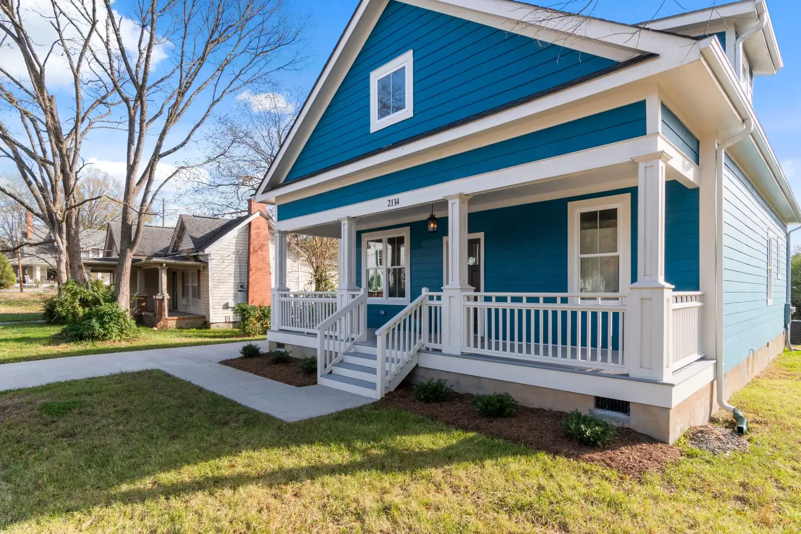 An older inherited family home with a front porch in Iowa