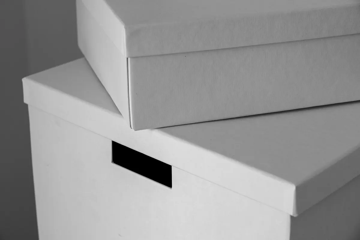 Stacked boxes in a house being sold as-is in Iowa