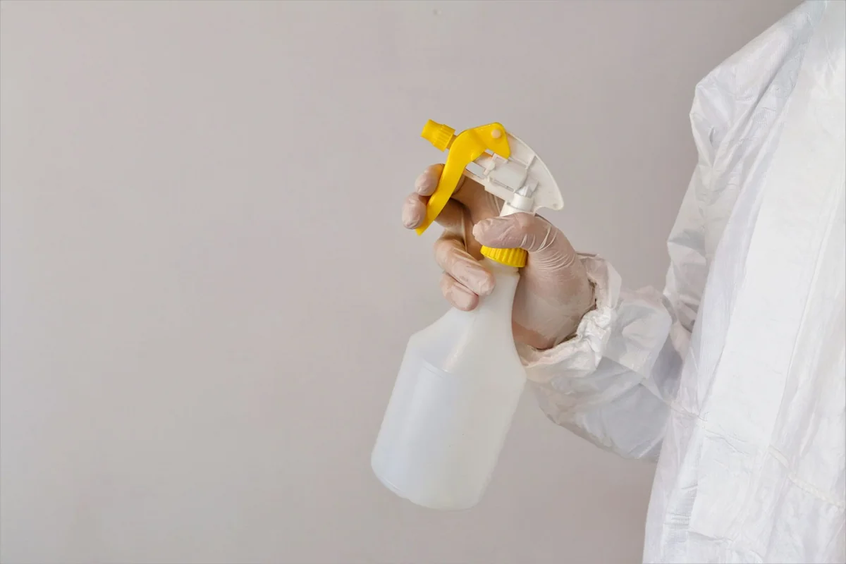 Cleaning supplies and protective gear, the kind used for professional meth remediation of a house