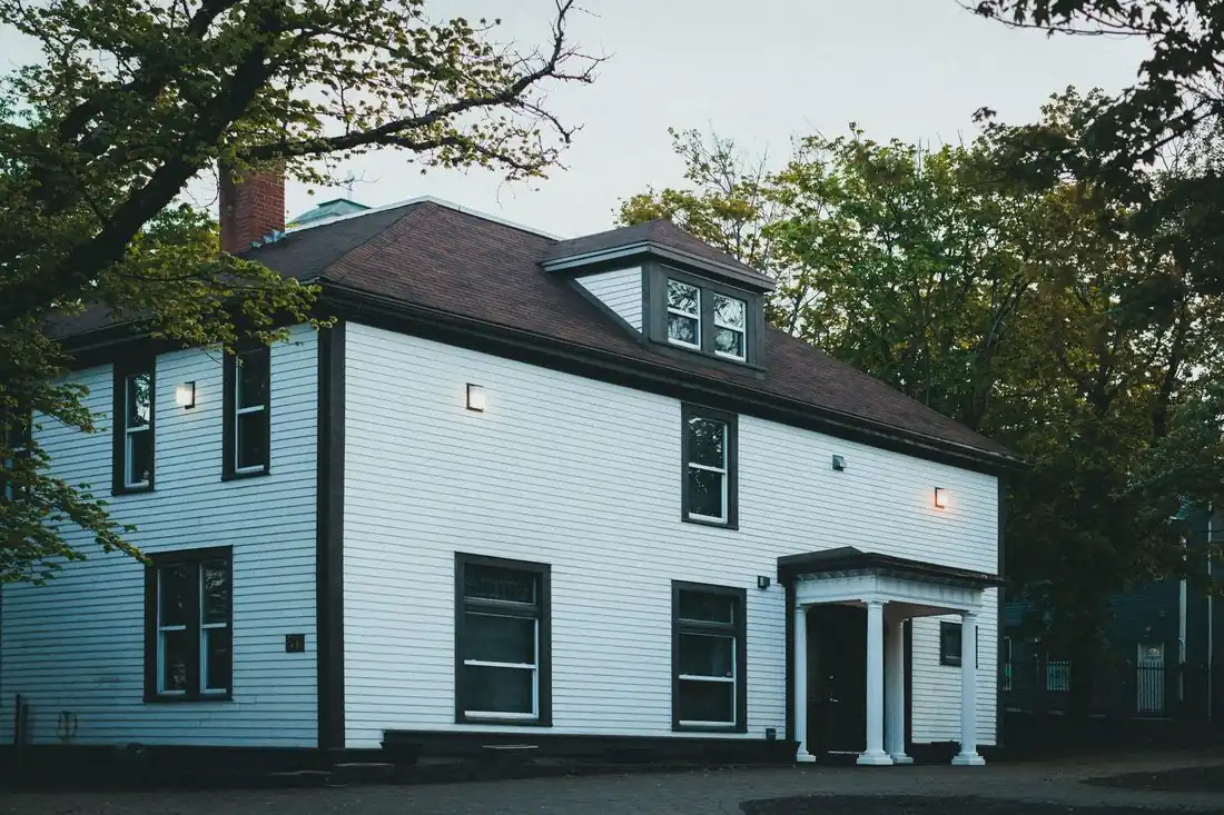 A quiet older Iowa home being sold after someone died there