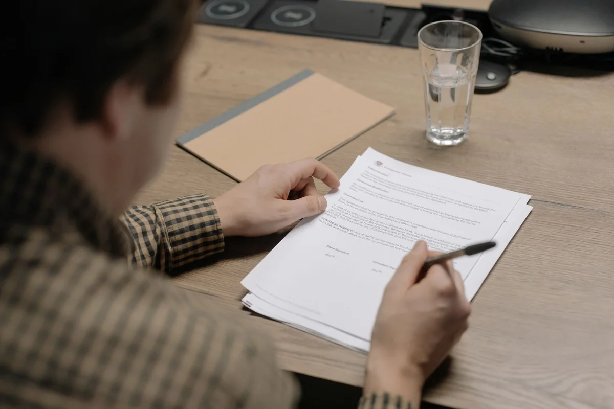 A seller signing an Iowa property disclosure that mentions known asbestos