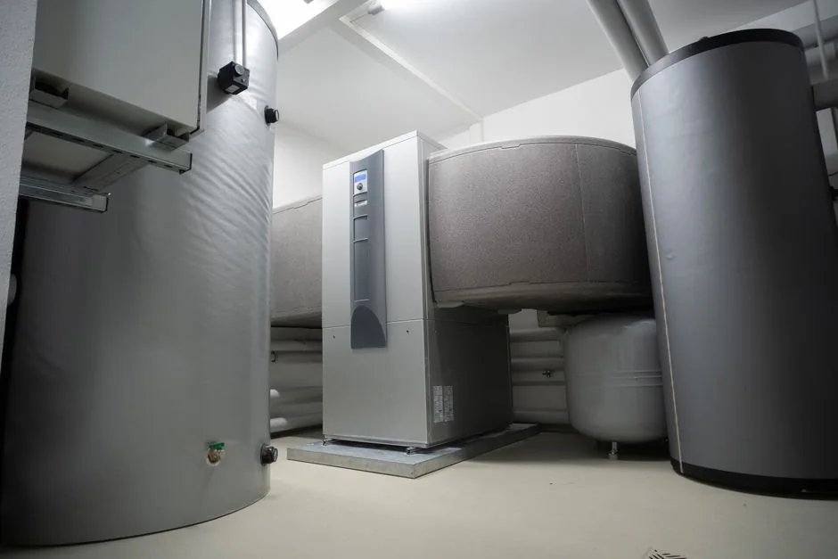 An aging home heating system in a basement mechanical room, a bad furnace to deal with before selling an Iowa house