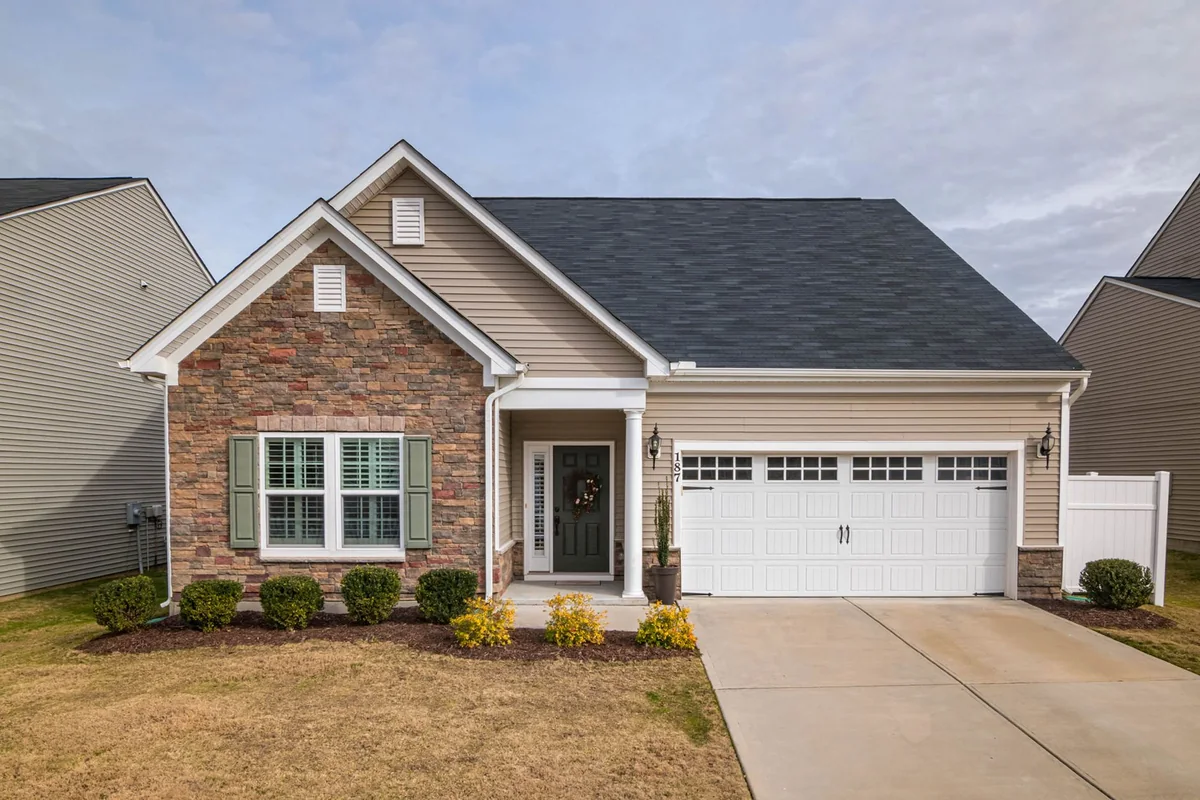 An Iowa house viewed from the curb where the roof is the first thing a buyer sees