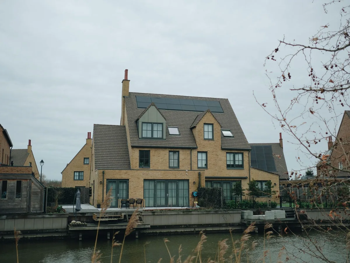 A modern house that could carry a solar lease, the kind of home financed buyers and lenders scrutinize in Iowa