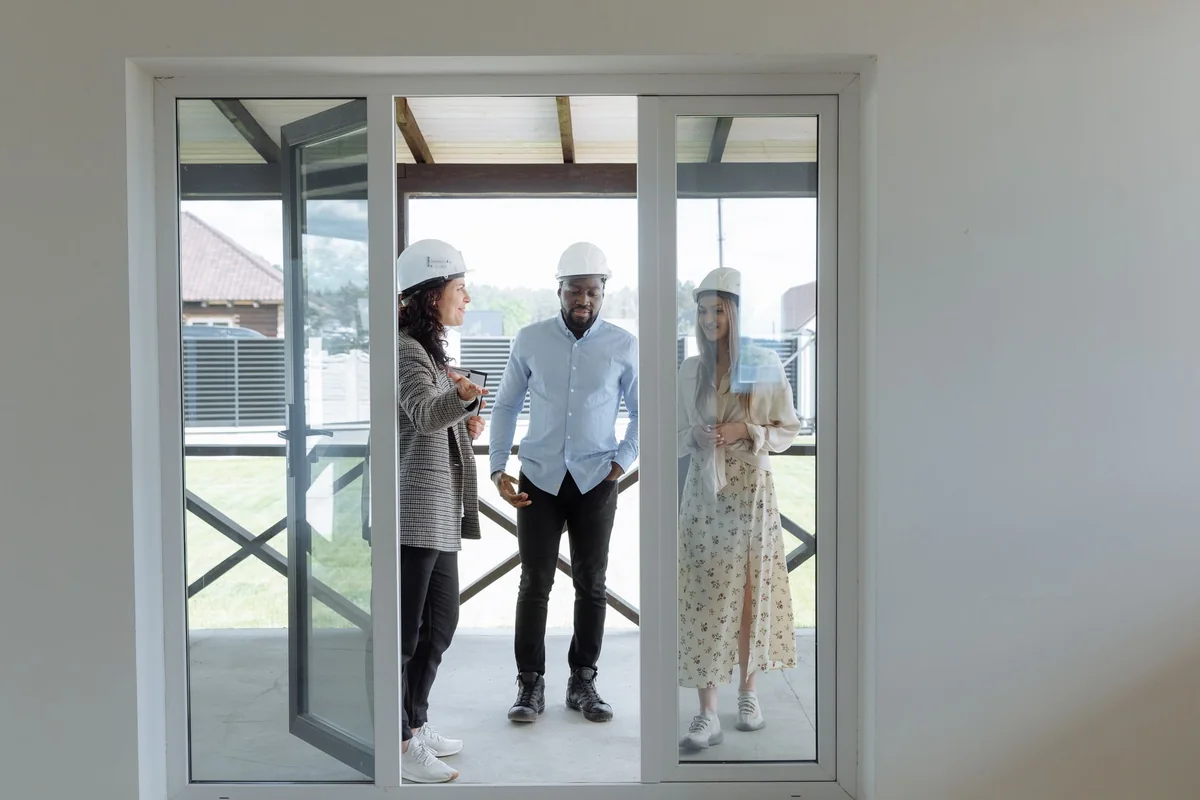 Real estate professionals discussing a fast cash sale of a house with a lien