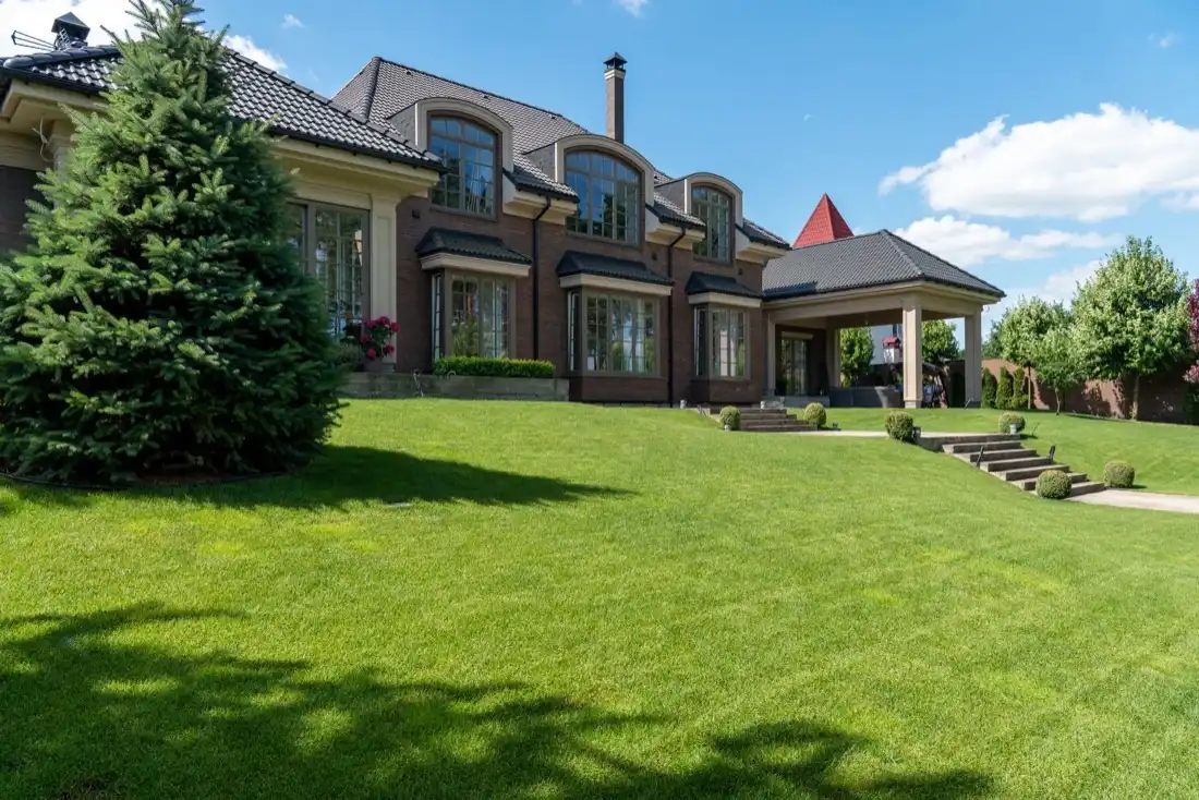 An Iowa home with a green lawn, the kind of house that can carry high radon and still sell