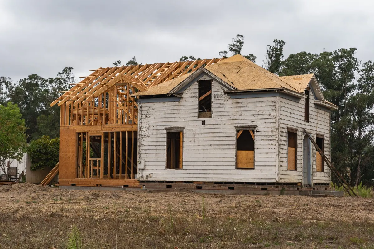 An older Iowa home needing repairs, the kind of house sold as-is to a cash buyer
