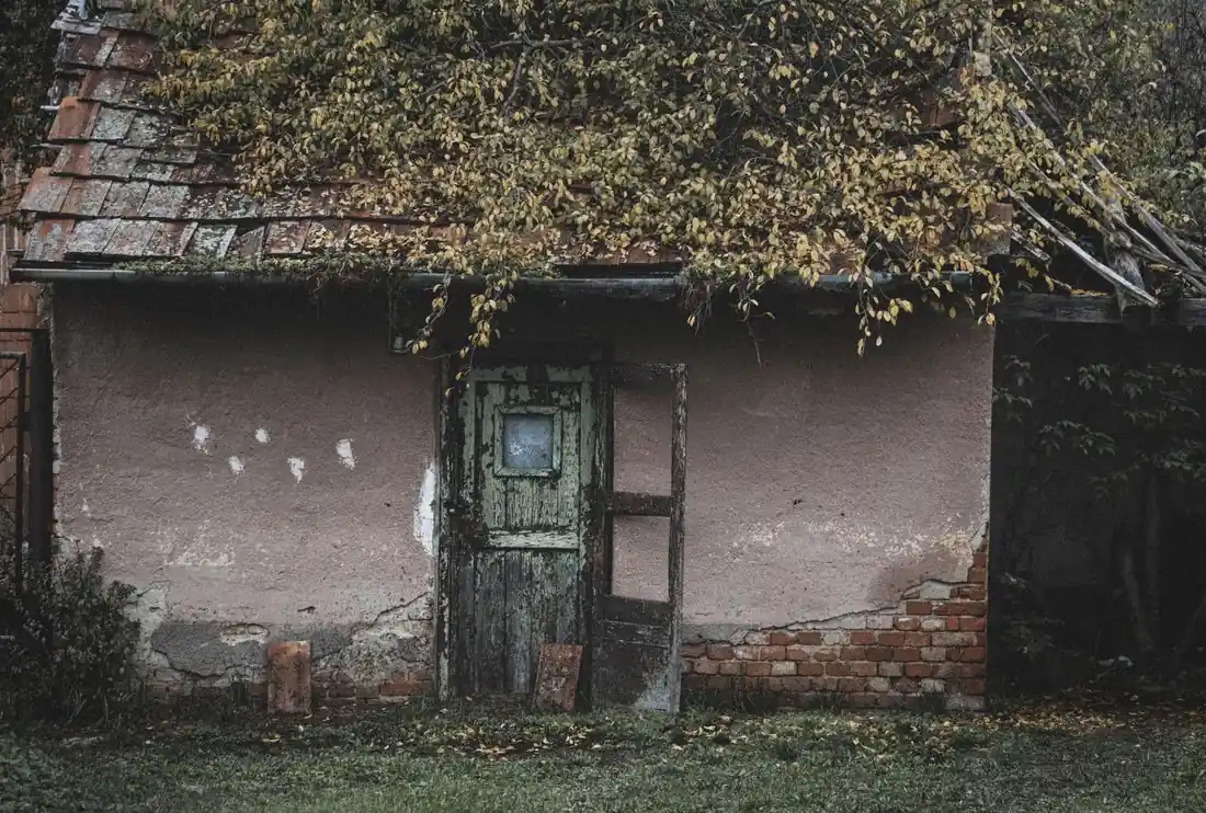 An old Iowa house with weathered wood, the kind that can hide termite damage