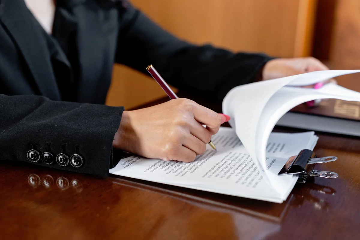 An attorney examining an Iowa abstract of title and writing a title opinion