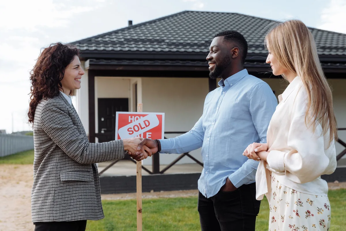 A handshake on a cash home sale that removes the timing risk of buying and selling at once
