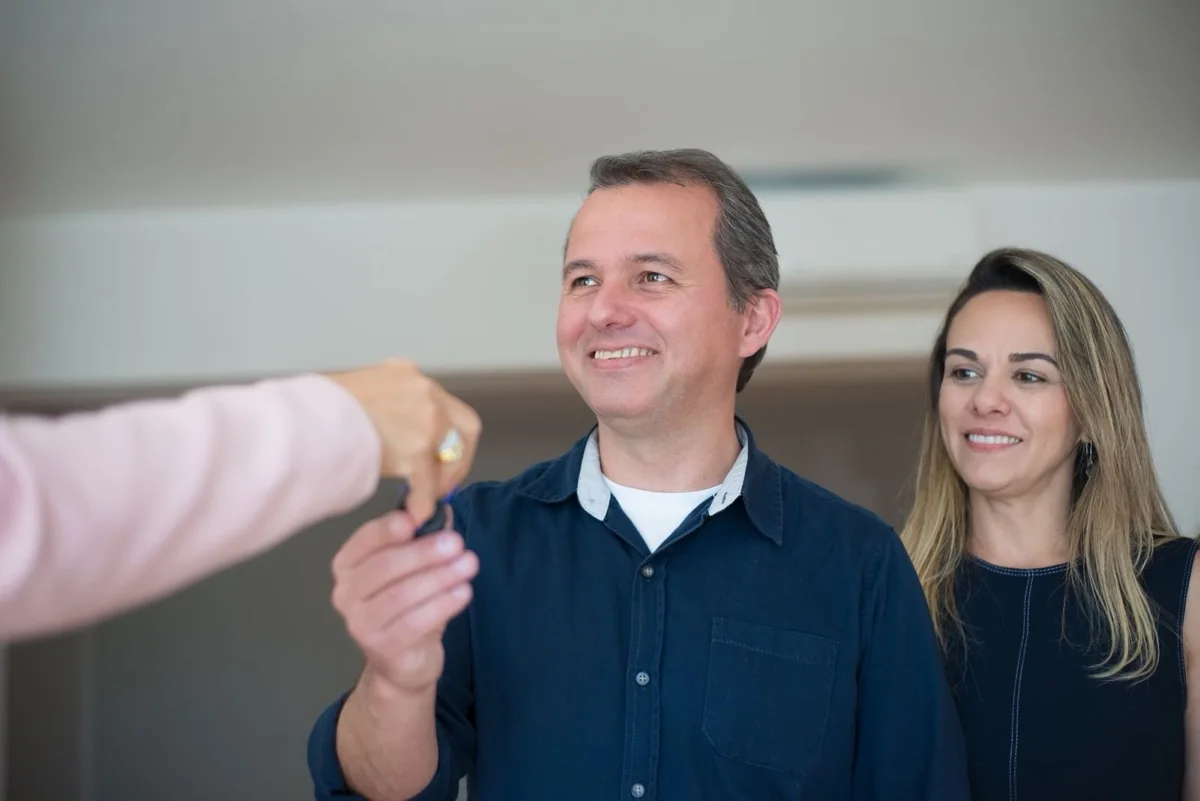 House keys handed over after selling a house before probate closes in Iowa