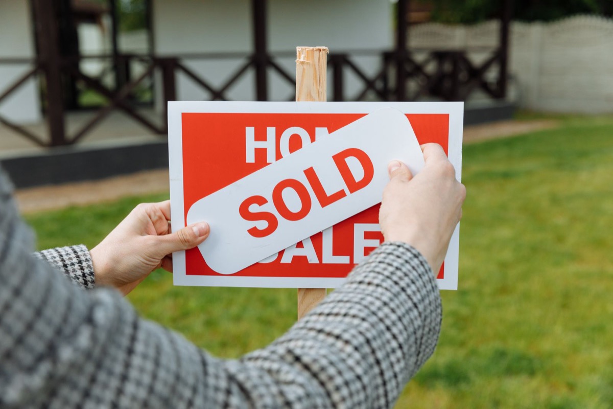 A sold home sign, the moment that makes Iowa sellers worry about taxes